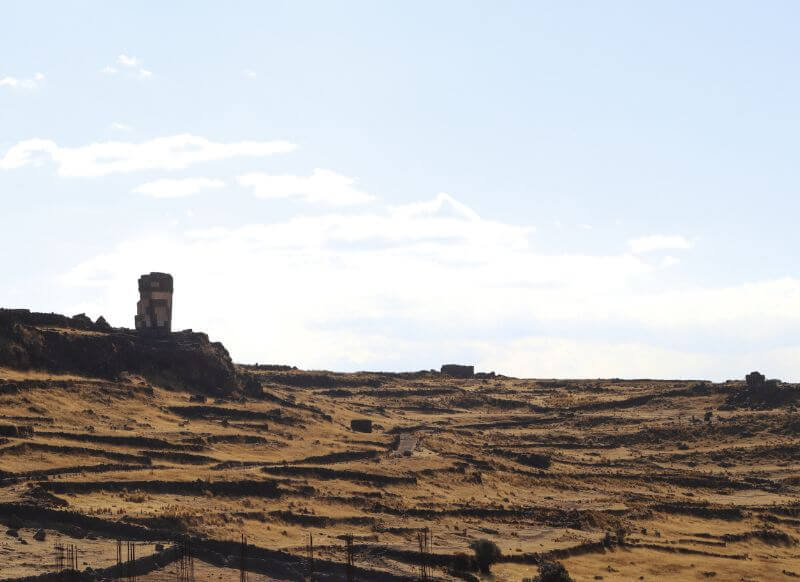 sillustani tomb towers from inca time get in peru